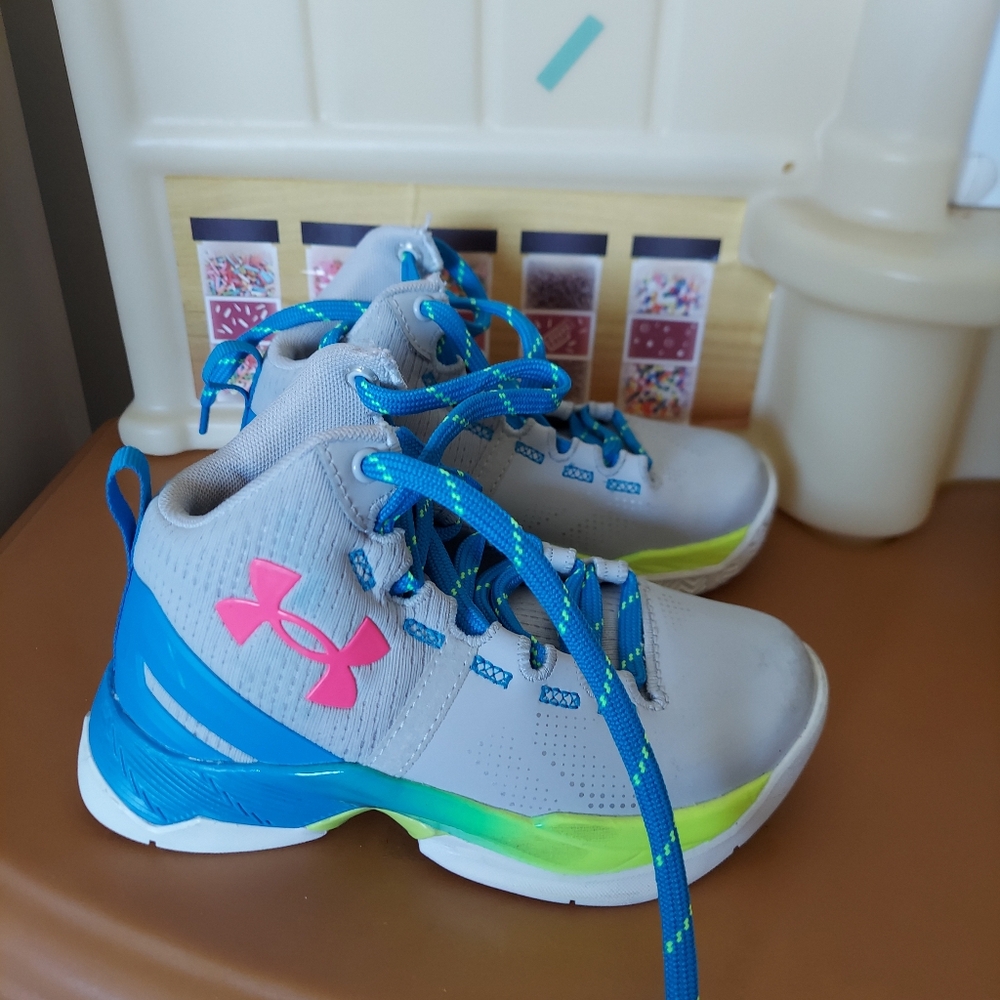 Boys shoes under Amour